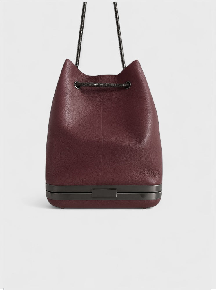 Kesmara Hulet Mini Drawstring Bag in burgundy leather, quiet luxury designer crossbody and tote, trending color investment handbag handcrafted in New York.