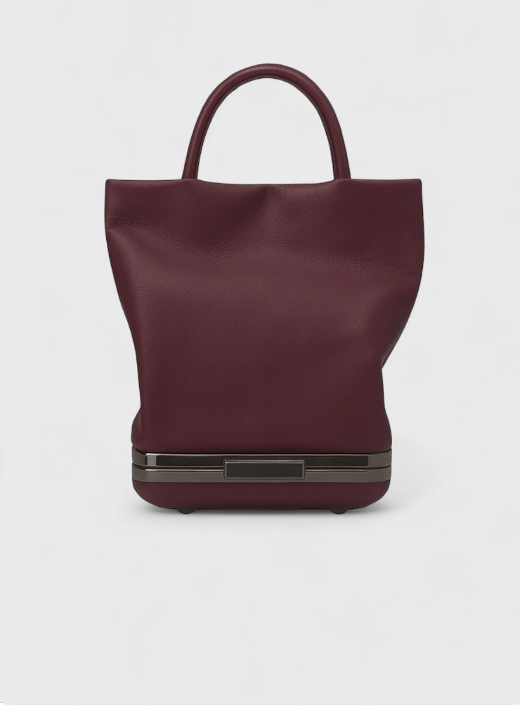 Kesmara Hulet Mini Tote in burgundy leather, quiet luxury mini tote and crossbody with hidden clutch compartment, handcrafted in New York, an investment handbag in a trending color.