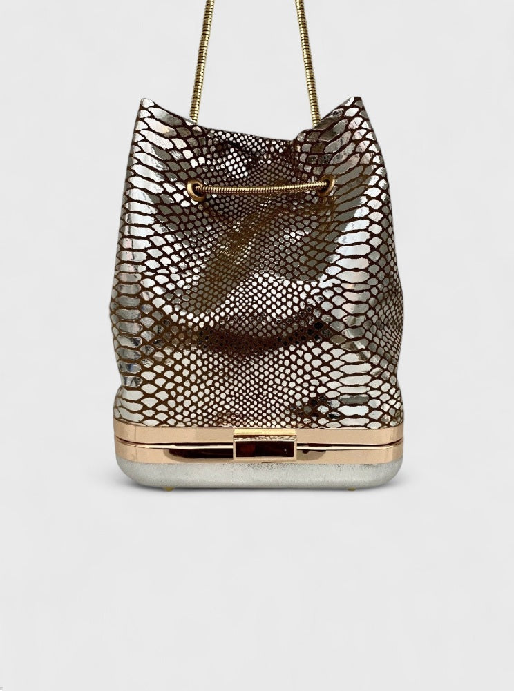 Kesmara Hulet Mini Drawstring Bag in silver snake printed metallic leather, quiet luxury mini tote and crossbody, a statement investment handbag handcrafted in New York