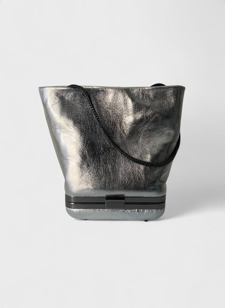 Kesmara Hulet Shoulder Bag in silver metallic leather, quiet luxury designer crossbody and shoulder bag, a bold investment handbag handcrafted in New York. Silver is the new black 